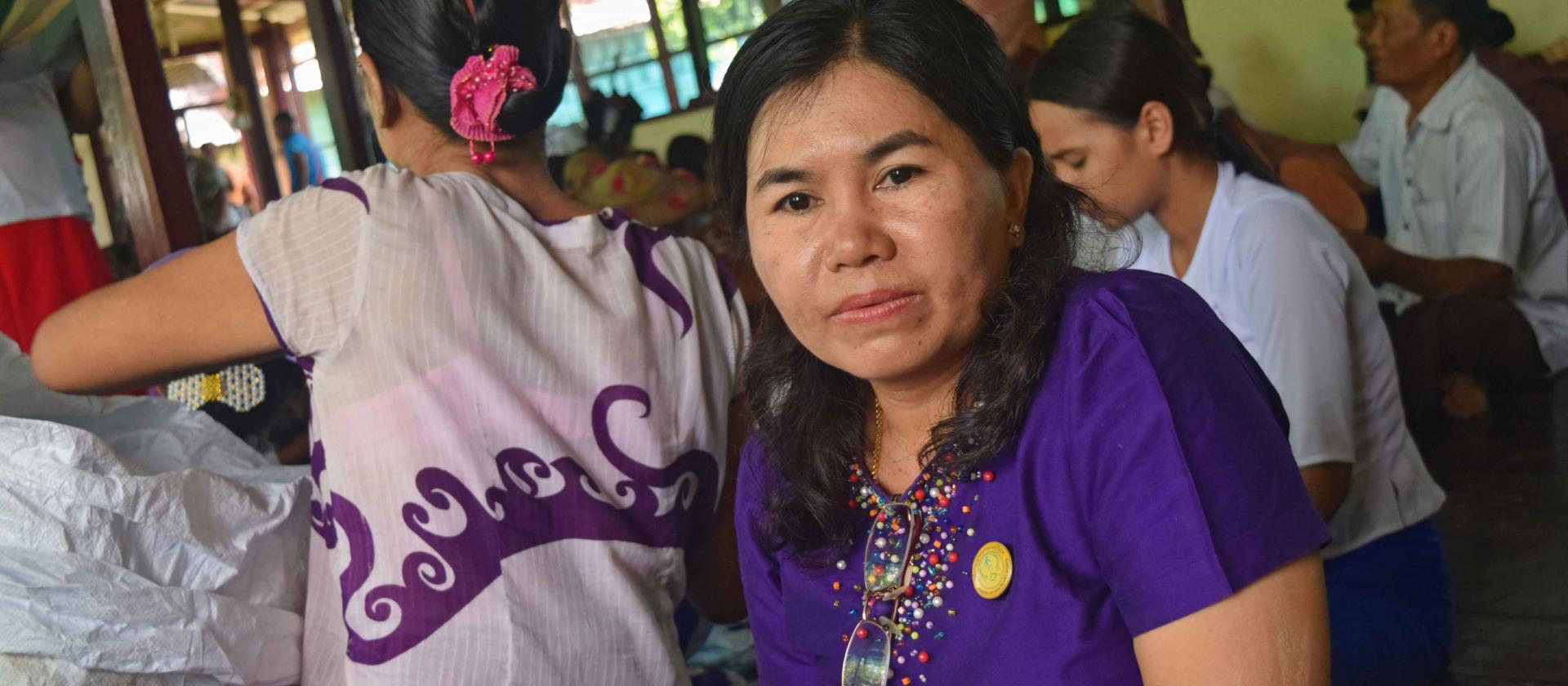 Daw Hla Hla Htay, Lab Technician Grade I, VBDC, Bago Region, at the LLIN mass distribution campaign, Pazunmyaung village. Photo: UNOPS Daw Hla Hla Htay, Lab Technician Grade I, VBDC, Bago Region, at the LLIN mass distribution campaign, Pazunmyaung village. Photo: UNOPS