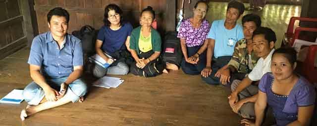 Dr Kyaw Zan Linn, UNOPS RAI Public Health Analyst together with the villagers and village leaders of Pyar Thar Chaung village, Dawei Township. Photo: UNOPS