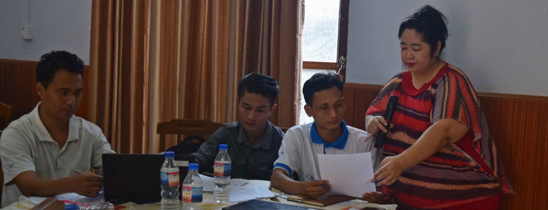 UNOPS-PR Capacity Building Associate Naw Deliver together with the Myanmar Council of Churches (MCC) field staff during a capacity building training in Kalay Township, Chin State. Photo: UNOPS