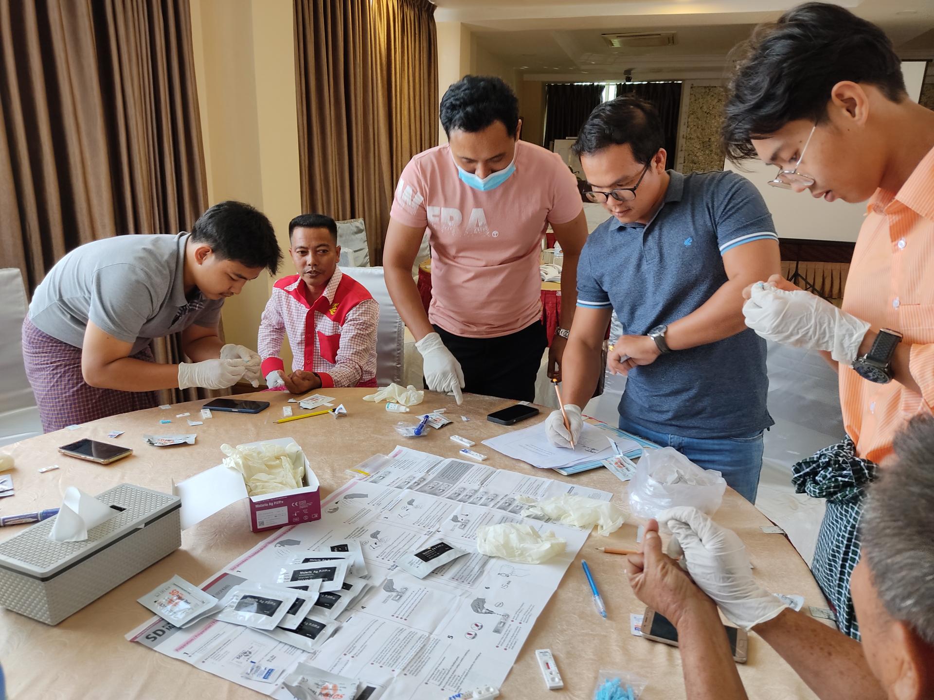 Training of worksite volunteers on malaria rapid diagnostic tests (RDT) by UMFCCI in Mawlamyine in June 2022. Photo: UMFCCI