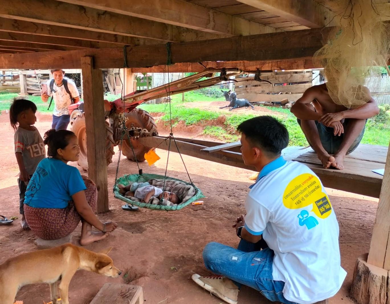 A village health volunteer provides essential newborn care guidance and primary health care advice during a home visit to a new mother. Photo: HPA A village health volunteer provides essential newborn care guidance and primary health care advice during a home visit to a new mother. Photo: HPA